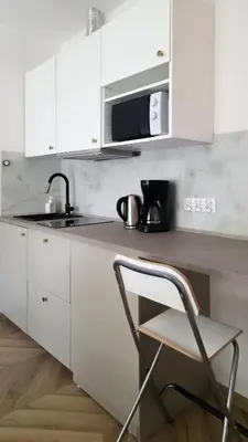 Kuchnia lub aneks kuchenny w obiekcie Cozy Apartment Pawlowa