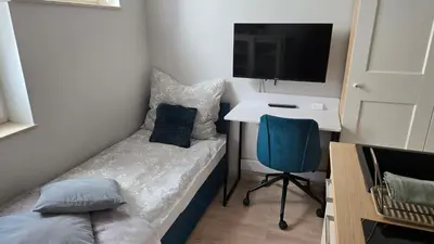 Telewizja i/lub zestaw kina domowego w obiekcie Mikroapartament Gamma Dyrekcyjna Wrocław