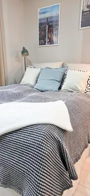 Łóżko lub łóżka w pokoju w obiekcie Fairytales Apartment Czysta II