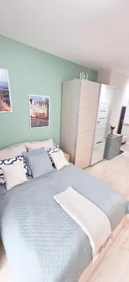 Łóżko lub łóżka w pokoju w obiekcie Fairytales Apartment Czysta III