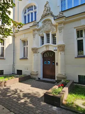 Fasada lub wejście do obiektu Justinrent 4