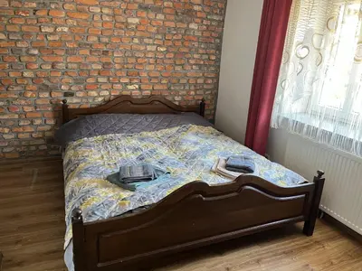 Łóżko lub łóżka w pokoju w obiekcie Apartamenty u Natana