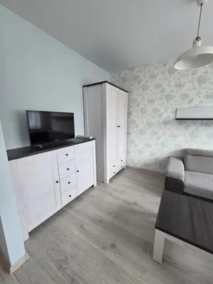 Telewizja i/lub zestaw kina domowego w obiekcie Apartament COMFORT Centrum 2