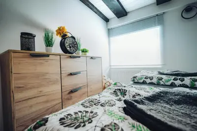 Łóżko lub łóżka w pokoju w obiekcie Orlicka Górka