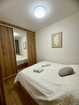 Łóżko lub łóżka w pokoju w obiekcie LOFT Apartament I Opole