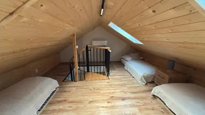 Łóżko lub łóżka w pokoju w obiekcie Jeleń Residence