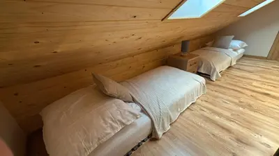 Łóżko lub łóżka w pokoju w obiekcie Jeleń Residence