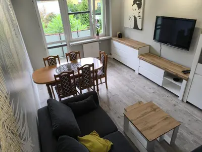 Telewizja i/lub zestaw kina domowego w obiekcie Belle Apartament
