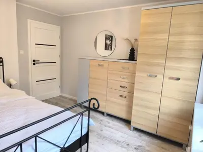 Łóżko lub łóżka w pokoju w obiekcie Belle Apartament
