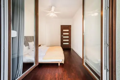 Łóżko lub łóżka w pokoju w obiekcie RentPlanet - Apartament Piękna z tarasem