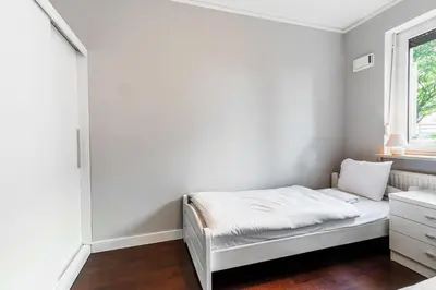 Łóżko lub łóżka w pokoju w obiekcie RentPlanet - Apartament Piękna z tarasem