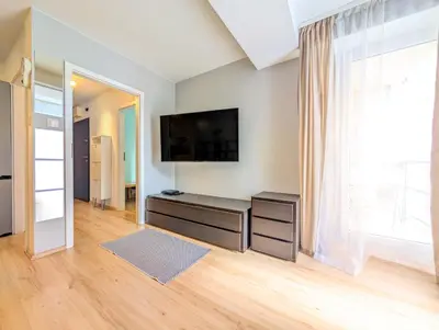 Telewizja i/lub zestaw kina domowego w obiekcie Kniaziewicza Old Town Apartment by BookingHost