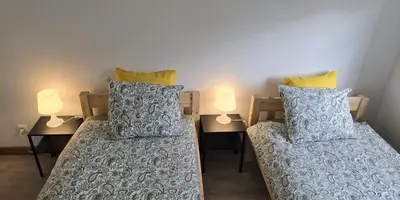Łóżko lub łóżka w pokoju w obiekcie Apartament Wenecja z ogródkiem,parking