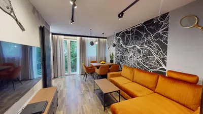 Część wypoczynkowa w obiekcie Tennis Family Lux Apartament City Center Nankiera 11