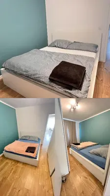 Łóżko lub łóżka w pokoju w obiekcie Apartment by Psie Pole