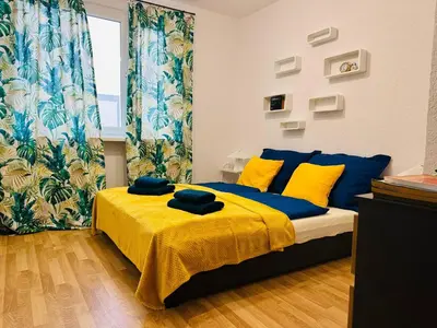 Łóżko lub łóżka w pokoju w obiekcie Perła Doliny Książa