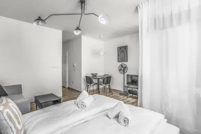 Łóżko lub łóżka w pokoju w obiekcie Nowe Centrum Południowe, Sun & Snow