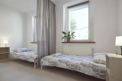 Łóżko lub łóżka w pokoju w obiekcie Apartament w Centrum Gliwic