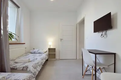 Łóżko lub łóżka w pokoju w obiekcie Apartament w Centrum Gliwic