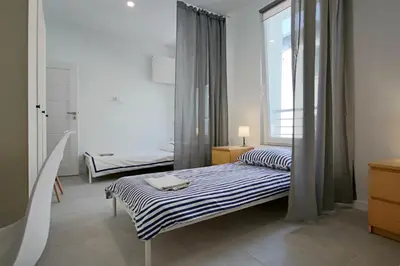 Łóżko lub łóżka w pokoju w obiekcie Apartament w Centrum Gliwic