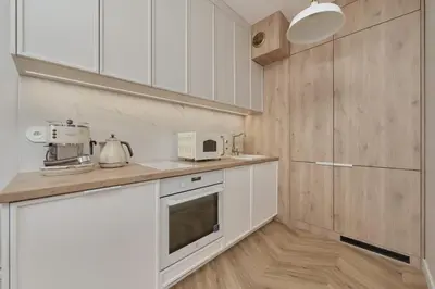 Kuchnia lub aneks kuchenny w obiekcie Elegant Apartment with Balcony Krakowska Wroclaw by Renters Prestige