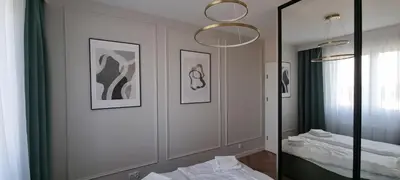 Łóżko lub łóżka w pokoju w obiekcie Prestige Apartment Oława