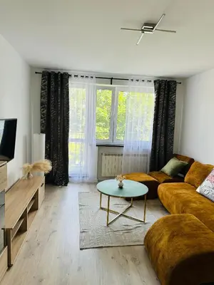 Telewizja i/lub zestaw kina domowego w obiekcie Apartament