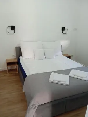Łóżko lub łóżka w pokoju w obiekcie Dom na Rzecznej