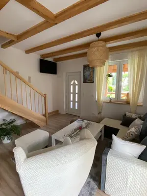 Telewizja i/lub zestaw kina domowego w obiekcie Domek na Skale - Apartament B ze strefą SPA