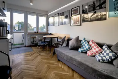 Kuchnia lub aneks kuchenny w obiekcie RentPlanet - Apartament plac Nowy Targ