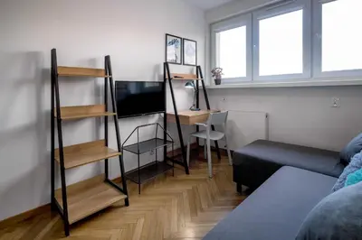Telewizja i/lub zestaw kina domowego w obiekcie RentPlanet - Apartament plac Nowy Targ