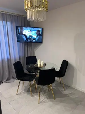 Telewizja i/lub zestaw kina domowego w obiekcie Badia
