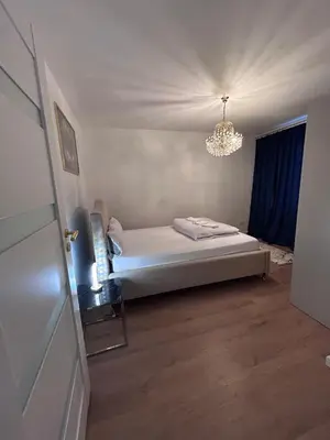 Łóżko lub łóżka w pokoju w obiekcie Badia
