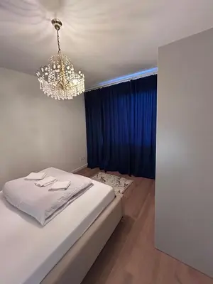 Łóżko lub łóżka w pokoju w obiekcie Badia