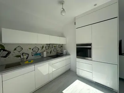 Kuchnia lub aneks kuchenny w obiekcie Spoko Apartament przy deptaku