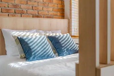 Łóżko lub łóżka w pokoju w obiekcie Apartament Centrum Strzelce PW INVEST HOME