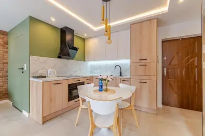 Kuchnia lub aneks kuchenny w obiekcie Apartament Centrum Strzelce PW INVEST HOME