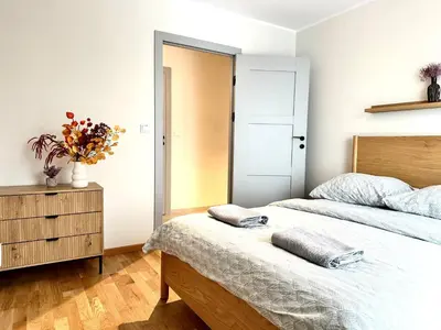 Łóżko lub łóżka w pokoju w obiekcie Madalińskiego Apt 25 - Balcony & Lift - 700m Main Station