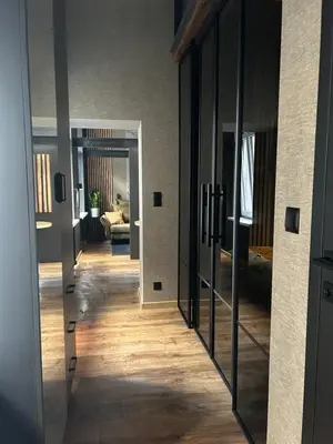 Łóżko lub łóżka w pokoju w obiekcie Central Elegance Apartment