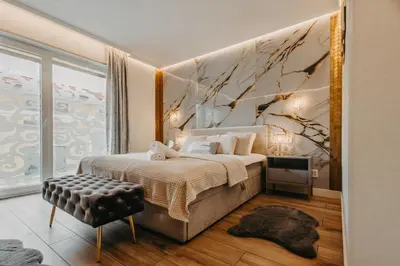 Łóżko lub łóżka w pokoju w obiekcie Witolda - luksusowy apartament w centrum - Fair Rentals