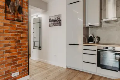 Kuchnia lub aneks kuchenny w obiekcie Witolda - luksusowy apartament w centrum - Fair Rentals