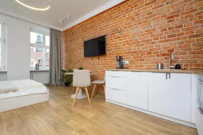 Telewizja i/lub zestaw kina domowego w obiekcie Central Lux Apartment - Heart of the Old Town Check In 24h