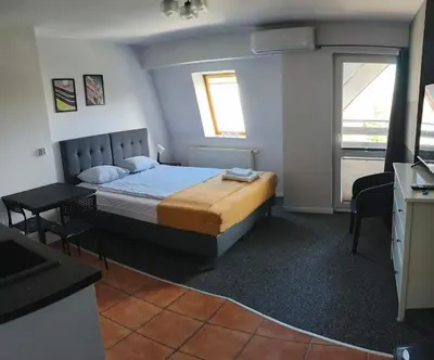 Łóżko lub łóżka w pokoju w obiekcie Skandi Studio