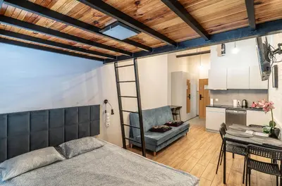 Łóżko lub łóżka w pokoju w obiekcie Apartament Paryski nr 5- Centrum, Wifi, 24 Check-in