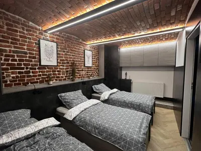 Łóżko lub łóżka w pokoju w obiekcie Limba Home