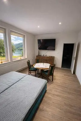 Łóżko lub łóżka w pokoju w obiekcie Hostel przy Żaglach