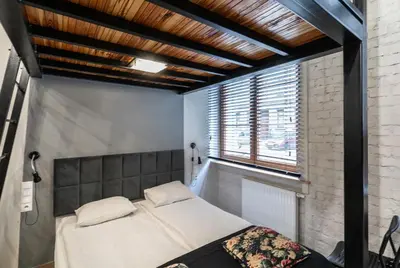 Łóżko lub łóżka w pokoju w obiekcie Apartament Paryski 4- WIFI, CENTRUM, 24H CHECK-IN