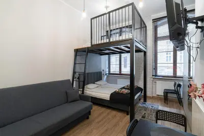 Łóżko lub łóżka w pokoju w obiekcie Apartament Paryski 4- WIFI, CENTRUM, 24H CHECK-IN