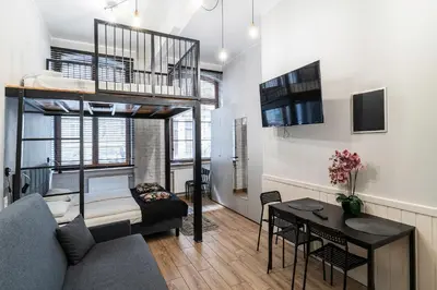 Telewizja i/lub zestaw kina domowego w obiekcie Apartament Paryski 4- WIFI, CENTRUM, 24H CHECK-IN