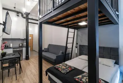 Łóżko lub łóżka w pokoju w obiekcie Apartament Paryski 4- WIFI, CENTRUM, 24H CHECK-IN